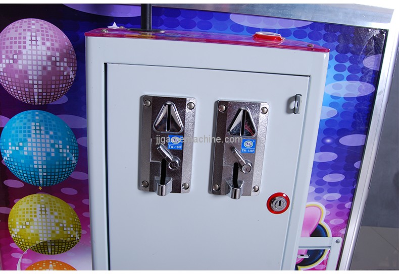 Chinese coin operated doll catching machine